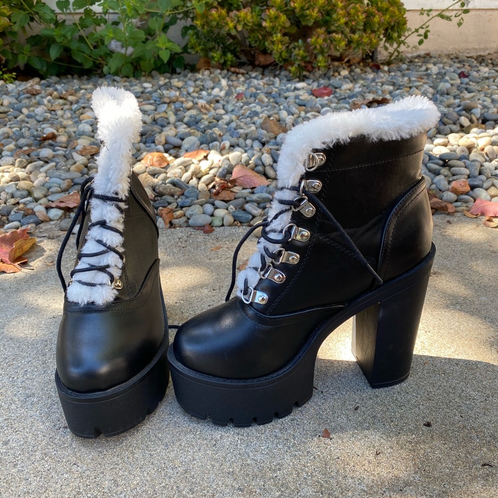 Black fur-lined heeled boots